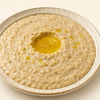 الهريس بالسمن في طبق